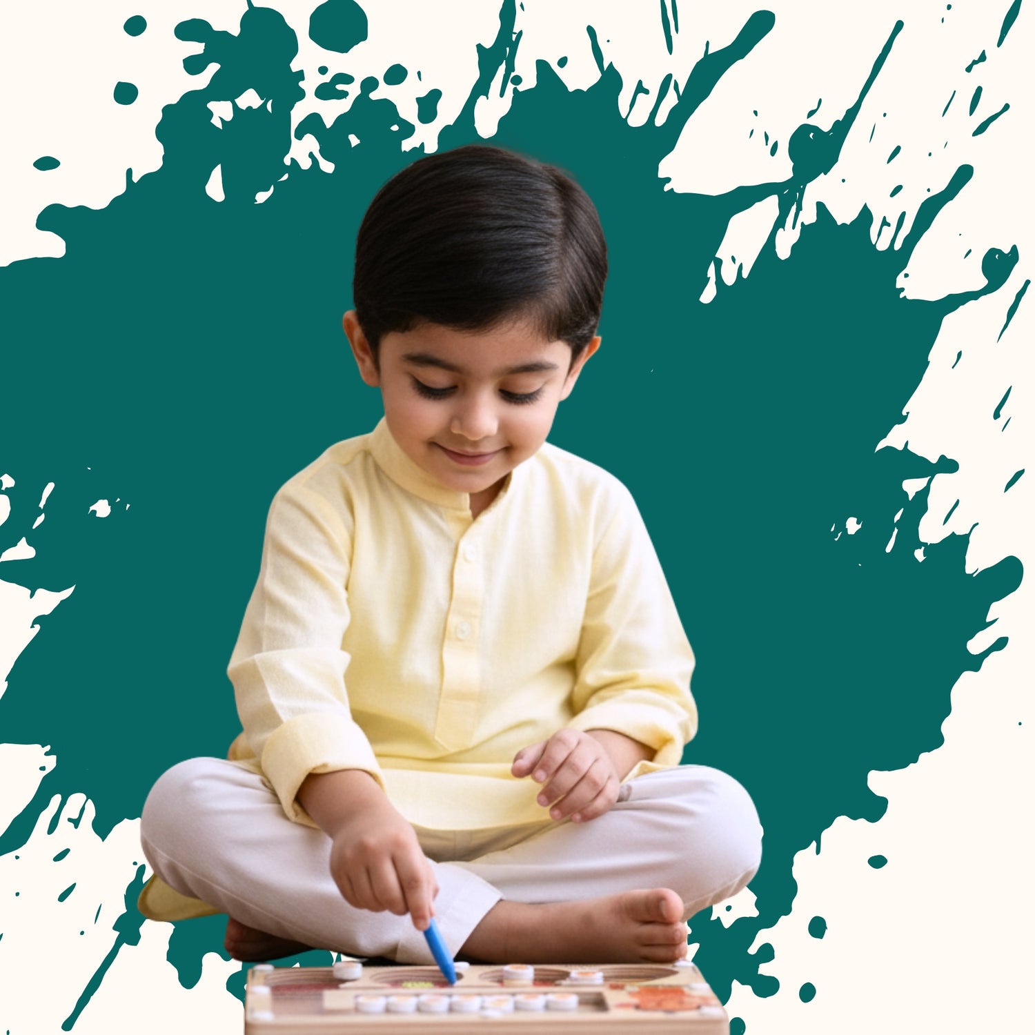 Indian child in a light yellow kurta sitting cross-legged on the floor, smiling with calm focus while playing with the VedaPlay Montessori wooden maze toy using a short blue stylus.
