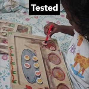 Manjunath's daughter testing the prototype